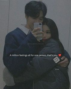 a man and woman hugging each other in front of a mirror with the caption, a million feelings all for one person, that's you