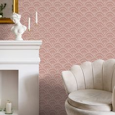 a white chair sitting in front of a fireplace next to a wallpapered wall