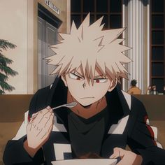 an anime character sitting at a table with a plate of food in front of him