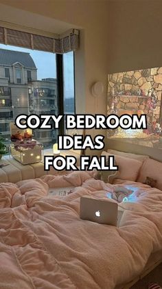 a bed room with a laptop on top of it and the words cozy bedroom ideas for fall