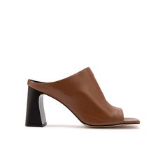 The Geran Dark Saddle Brown Floater Leather Women's Heeled Slide is a fusion of style and comfort. Crafted from premium dark saddle brown floater leather, these slides offer a luxurious feel. The heeled design adds sophistication while maintaining ease of wear.   With a slip-on style, they provide convenience for everyday use. Versatile enough for both casual outings and more formal occasions, these slides elevate any look with their refined aesthetic and superior craftsmanship. Dark Saddle Brow Fashion Designers Famous, Refined Aesthetic, Brown Leather Heels, Saddle Brown, Pearl Jewellery Earrings, Fine Jewelry Gift, Leather Care, Gifts For New Moms, Womens Heels