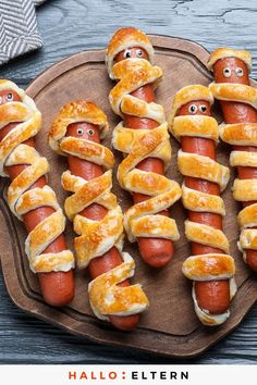 hot dogs wrapped in bread with googly eyes