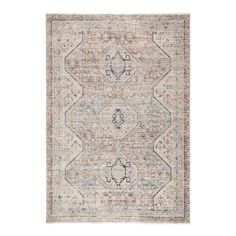 a rug with an intricate design on the front and back, in neutral tones that are soft