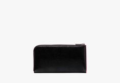 Reach for our Devin continental wallet on repeat. It’s made from scratch-resistant patent Saffiano leather so it’ll keep its glossy look for years to come. | Kate Spade Devin Glitter Edged Zip-Around Continental Wallet, Black Glossier Look, Kate Spade Wallet, On Repeat, Continental Wallet, Kate Spade, Glitter, Wallet, Leather, Black