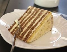 a piece of cake sitting on top of a white plate