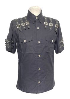 "BFF104 / I3-3 This is Black cotton shirt with 12 silver buckles on shoulder and 4 buckles on half sleeves Details. Shirt  has 2 brest Sides pocket and metal silver jean button buttons. belts with eyelets on synthetic black leather belts  Please refer to photos. Available in to fit chest sizes  36\" 38\" 40\" Front Length - 27.5\"approximately  Back length - 27\" approximately  Please note:- Even though there is a choice of sizes, these are made to order and are customise to your requirements . I do not carry stock and hence do not do refunds. Please check the sizes before you commit to your purchase. Thank you Thank you for looking" Summer Punk Shirt For Alternative Fashion, Alternative Style Summer Shirt For Alternative Fashion, Summer Alternative Fashion Shirt, Sleeves Details, Gothic Punk, Jeans Button, Black Leather Belt, Silver Jeans, Leather Belts