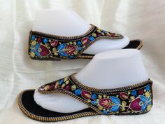 Casual, colourful shoes and sandals in leather from India: Fashion footwear for the contemporary city dweller, from five centuries back. Mumtaz, the lady for whom the Taj Mahal was built probably lived in shoes and sandals much like these. Originally meant for the Maharajahs and the Maharanis [Kings and Queens and such royalty], these handcrafted fashion footwear for men and women mainly come from the villages of Punjab and Rajasthan. This period fashion piece was introduced to India during the Traditional Handmade Closed Toe Huarache Sandals, Traditional Closed Toe Huarache Sandals For Festivals, Traditional Sandals With Single Toe Strap For Festive Occasions, Traditional Festive Sandals With Single Toe Strap, Traditional Blue Closed Toe Sandals, Multicolor Embroidered Closed Toe Sandals, Embroidered Closed Toe Multicolor Sandals, Traditional Multicolor Sandals With Round Toe, Traditional Multicolor Sandals For Festivals