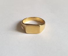 Gold signet ring, signet ring women, gold pinky ring, pinky ring women, rectangle signet ring This gold signet ring is just the perfect, classic pinky ring for women. The gold pinky ring is square and minimalist and simply right for your finger. The signet ring was handmade from start to finish by carving in wax, and later casted in different metals. The pinky ring is available both in 14k, nickel free, gold plating over brass or sterling silver base. I also offer this ring in 14k solid gold yel Elegant Rectangular Signet Ring Tarnish Resistant, Minimalist 14k Gold Rectangular Signet Ring, Minimalist Rectangular Tarnish Resistant Signet Ring, Rectangular Minimalist Tarnish-resistant Signet Ring, Simple Yellow Gold Signet Ring Gift, Gold Rectangular Initial Ring Minimalist Style, Simple Yellow Gold Signet Ring For Promise, Gold Rectangular Minimalist Initial Ring, Rectangular 14k Gold Signet Ring Gift