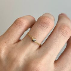 14KT yellow gold bezel .02 CT natural diamond chain link ring. So dainty and minimally designed! Very striking! Size 6 Sizing bar in back Can be resized for an additional fee .02 carat, round, natural diamond; bezel-set I3 clarity; H color diamond 1.6mm size diamond Weight: .55 gram Solid 14k Saint Jewelry, Linking Rings, Diamond Chain, Bezel Setting, Chain Link, Natural Diamonds, Yellow Gold, Yellow, Chain