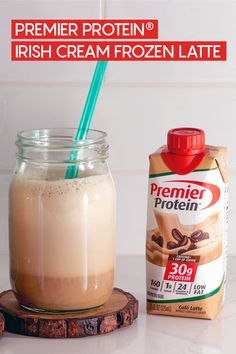 a jar of protein drink next to a carton of milk