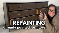 a woman is pointing at the bottom of a dresser with drawers on it and text explaining how to repaint furniture