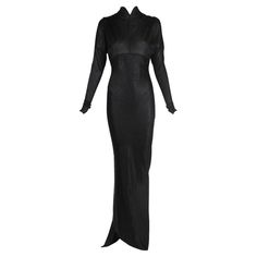 Iconic Azzedine Alaia Black Bodycon Trained Gown, 1986 | From a unique collection of rare vintage Evening Dresses and Gowns at https://www.1stdibs.com/fashion/clothing/evening-dresses/. Black Long Sleeve Bodycon Dress, Black Bodycon Dress Long Sleeve, Azzedine Alaia, 1980s Dresses, Sleeve Bodycon Dress, Mini Sweater Dress, Long Sleeve Bodycon Dress, Black Knit, Jersey Dress