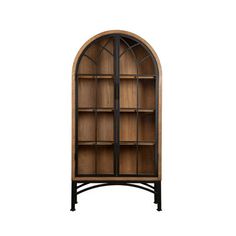 an arched wooden bookcase with glass doors on the top and bottom shelf, against a white background