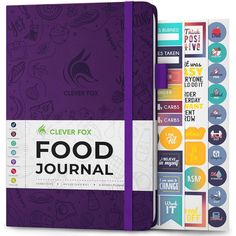 the clever food journal with stickers on it