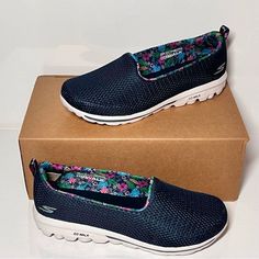 Pull-On Mesh Upper Floral Printed Lining, Goga Mat Technology Insole, Ultra Go Cushioning Midsole Approximately 7/8"H Heel Fit: True To Size Textile/Man-Made Upper Peta-Certified Vegan Machine Washable Width: Wide Blue Casual Walking Shoes For Spring, Casual Blue Walking Shoes For Spring, Blue Slip-on Walking Shoes For Spring, Comfortable Blue Walking Shoes For Spring, Comfortable Blue Spring Walking Shoes, Casual Blue Walking Shoes, Blue Casual Walking Shoes With Arch Support, Casual Blue Walking Shoes With Arch Support, Shoes Skechers