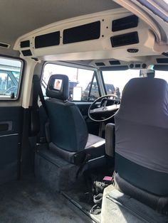 the interior of a vehicle with seats up