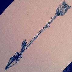 a drawing of a pen and arrow on paper