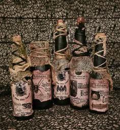 several bottles are wrapped in twine and rope