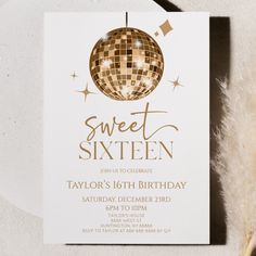 a white and gold birthday party card with a disco ball on the front that says sweet sixteen