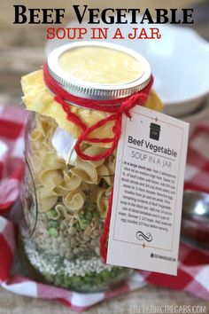 a jar filled with beef vegetable soup in a jar