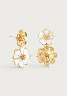 Add a pop of fun and personality to any outfit with our Wildflowers Mixed Drop Earrings. These playful earrings feature delicate wildflowers for a statement look that will surely make you stand out. Elevate your style with these must-have earrings. 18K Gold Plated Brass Hand Painted Enamel Anabel Aram Signature Earring Backs 1.75" L x 0.85" W Brass Cluster Floral Earrings, Adjustable Multicolor Whimsical Flower Earrings, Gold Whimsical Flower-shaped Earrings, Gold Botanical Flower Earrings, Michael Aram Black Orchid, Gold Flower-shaped Earrings With Pressed Flowers, Black Orchid, Gift Card Shop, Floral Earrings