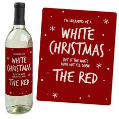 a white christmas wine bottle next to a card with the words i'm dreaming of a white christmas but if the white runs out red