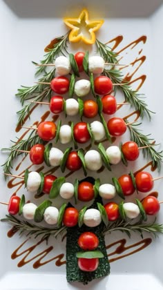 Wow your guests with these holiday-inspired Caprese skewers! Fresh cherry tomatoes, mozzarella, and basil are beautifully arranged in a Christmas tree shape, topped with a balsamic glaze drizzle and a yellow bell pepper star. A fun and festive appetizer for Christmas gatherings! 🎄✨ #ChristmasAppetizers #CapreseSkewers #HolidayRecipes Christmas Hor D'oeuvres, Appetizer For Christmas, Holiday Party Snacks, Caprese Appetizer, Mozzarella Caprese, Tomato Caprese, Christmas Tree Shape, Yellow Bell Pepper, Tomatoes Mozzarella