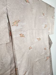 "Japanese Kimono Robe Brown Floral Kimono Dress | Floral Kimono | Kimono Cardigan | Long Kimono Robe | Yukata kimono Please check the measurements we have provided to ensure a proper fit. ▪️ MEASUREMENTS ▪️ Width (shoulder seam to shoulder seam): 23.5\" Inches. Length (from base of collar to bottom): 63\" Inches. End Sleeve to End Sleeve : 51\" Inches Good Condition. Please enlarge the photos to get clear image. All measurements are taken with the garment flat on the ground. Customs Tax or Fees Beige Embroidered Kimono With Kimono Sleeves, Traditional Beige Long Sleeve Kimono, Traditional Long Sleeve Beige Kimono, Yukata Kimono, Adult Pajamas, Vintage Japanese Kimono, Cotton Kimono, Long Kimono, Floral Kimono