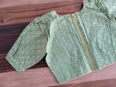 Blouse Stitched - Yes Blouse size - 38 with inner margins expandable upto 44 For Blouse Size 36 alteration can be done on request. Fall/pico - Yes done Green Bollywood Blouse With Chikankari Embroidery, Green Chikankari Embroidery Top For Wedding, Green Chikankari Embroidered Top For Wedding, Bollywood Style Cotton Silk Blouse With Chikankari Embroidery, Bollywood Style Blouse With Chikankari Embroidery In Cotton Silk, Fitted Green Tops With Self Design, Green Fitted Tops With Unique Design, Long Sleeve Cotton Blouse With Cutdana, Fitted Cotton Blouse With Unique Design