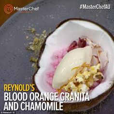 a close up of food on a plate with words above it that reads, revold's blood orange granita and chamole