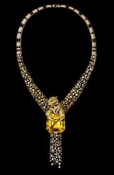 The Emblematic Panther – High Jewelry Necklace Yellow gold, one 86.85 carat emerald-cut yellow beryl, yellow diamonds, brown diamonds, emera... Brown Diamonds, Yellow Diamonds, Yellow Stone, Cat Jewelry, Brown Diamond, Yellow Diamond, Exquisite Jewelry