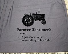 a t - shirt with an image of a tractor and the words farmer fah - mer