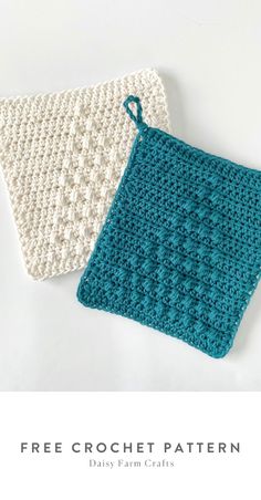 two crocheted pot holders sitting next to each other