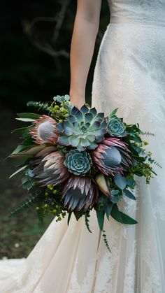 Stunning Succulent & Protea Wedding Bouquets Succulent Wedding Bouquet Spring, Succulent And Fern Bouquet, Succulents For Weddings, Live Plant Bouquet, Succulent Wedding Flowers, Succulent Wedding Bouquet Fall, Wedding Flowers With Succulents, Succulent Wedding Arrangements, Fern Wedding Bouquet