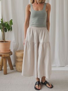 Get excited for our first-ever women's skirt designed to be worn day in, day out! Now, you can finally create twinning outfits for you and your little one! 100% organic linen, 185g. We are introducing a NEW women's version of our bestselling Tutti skirt. Lightweight and breathable with an elegant shape that falls to a mid-calf length, is ideal for summer escapades, beach-days or evening alfresco. It's simple, versatile and easy to style plus it has two handy pockets. Both our models are 165 tall Linen Tiered Skirt For Day Out, Summer Linen Flowy Skirt, Cotton Lined Skirt For Everyday Wear, Everyday Cotton Lined Skirt, Summer Tiered Linen Skirt, Summer Cotton Tiered Skirt Bottoms, Summer Tiered Cotton Skirt, Summer Linen Relaxed Skirt, Casual Linen Tiered Skirt Bottoms