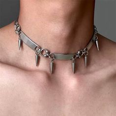 Make a bold fashion statement with this Y2K-inspired metal choker. Featuring edgy spikes for a fierce look, this necklace is perfect for alternative fashion lovers, goth style enthusiasts, and anyone who wants to stand out. Add this statement piece to your collection for a unique twist on classic Y2K accessories. Shop now for the ultimate edgy style!

Hashtags: #Y2KStyle #GothicJewelry #SpikedChoker #AlternativeFashion #EdgyAccessories #MetalChoker #GothStyle #Y2KAccessories #BoldNecklace #StreetStyle Metal Collar, Grunge Accessories, Necklace Luxury, Retro Punk, Estilo Punk