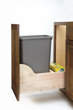 The Rev-A-Shelf 50-Quart Pullout Garbage Can for the kitchen cabinet is the ideal solution for your kitchen waste needs. Conveniently store your trash bins tucked away in your drawers so you can maintain your kitchen's lovely appearance. This under sink trash can is designed for 15-inch cabinets with a 12-inch opening. It's constructed of a dovetail frame with a satin finish. It can fit single 50-quart trash bin containers. This Rev-A-Shelf pullout trash can model includes (1) 50-quart container Pull Out Trash Cans, Trash Containers, Rev A Shelf, Waste Container, Recycling Center, Kitchen Waste, Trash And Recycling Bin, Kitchen Tops, Trash Bins