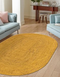 Living up to its nickname as the Golden Fiber jute is a staple in organic home décor. Hand-braided in India from natural jute and cotton fibers, our Braided Jute Collection features a variety of patterns and neutral colors that make these rugs the perfect base for any room's design. As soft as they are durable, these rugs are the perfect organic accent to any room's design. Unique Loom Braided Jute 3 X 5 (ft) Braided Jute Yellow Oval Indoor Solid Area Rug | 3161133 Bohemian Living Room Rugs, Oval Area Rug, Oval Rug, Porch Rug, Natural Jute Rug, Braided Jute Rug, Solid Area Rugs, Jute Area Rugs, Oval Rugs