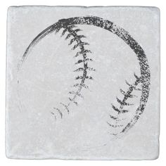 a stone coaster with a baseball drawn on it