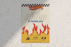 a poster on the wall that says, hot wheels abden is burning you 20 cents