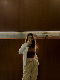 Light Brown Tank Top Outfit, Khaki Pants And Brown Top, Brown Crop Tank Top Outfit, Mall Fits Aesthetic, Brown Tank Top Outfit Aesthetic, Brown Sleeveless Top Outfit, Light Brown Top Outfit, Brown Tank Outfit, Beige Tank Top Outfit