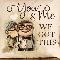 a pillow with an image of a man and woman kissing on the cheek, saying you & me we got this