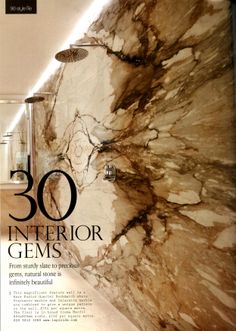 the front cover of an architectural magazine with marbled walls and flooring in it