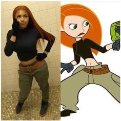 a woman in black shirt and green pants standing next to cartoon character with cell phone