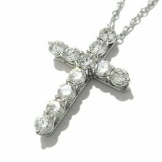 TIFFANY & Co. Platinum .42ct Diamond Cross Pendant Necklace Metal: Platinum Chain: 16" long Pendant: 0.71"(18.1mm) long x 0.52"(13.2mm)" wide Diamond: 11 round brilliant diamonds, carat total weight .42 Hallmark: ©TIFFANY&Co. PT950 Condition: Excellent condition, like new, comes with Tiffany pouch, box and ribbon bow Tiffany price: $4,100 Authenticity Guaranteed Tiffany And Co Jewelry, Platinum Chain, Diamond Cross Pendants, Diamond Cross, Tiffany And Co, Long Pendant, Cross Pendant Necklace, Ribbon Bow, Fine Jewellery Necklace