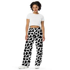 Upgrade your loungewear with our All-Over-Print Unisex Wide-Leg Pants, designed for ultimate comfort and style. These best-selling pants effortlessly blend fashion with function, making them perfect for everything from cozy pajamas to trendy streetwear. Whether you're lounging at home or stepping out, their super soft, stretchy fabric ensures comfort in every move. Crafted with premium knit mid-weight jersey fabric, these pants feature a relaxed unisex fit and an adjustable elastic waistband with a white drawstring for added comfort. Plus, the practical side pockets make them ideal for daily wear. Choose to wear them on the waist or hips for a customizable fit. The fabric's OEKO-TEX 100 standard certification guarantees safe, eco-friendly material that's gentle on the skin. Whether you're Comfy Lounge Pants, Pants Comfy, Comfy Lounge, Adult Pajamas, Cozy Pajamas, Trendy Streetwear, Pj Pants, Pants With Pockets, Elastic Waist Pants