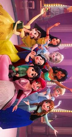 the disney princesses are posing for a photo together