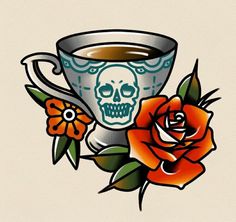 a cup of coffee with a skull on the side and flowers in front of it