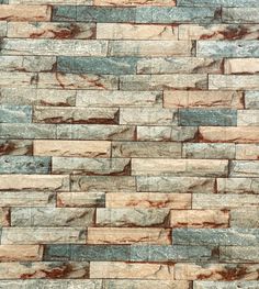 a brick wall with brown and blue bricks