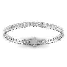 The bezel set shaped diamond tennis bracelet is handcrafted in 14K or 18K yellow, rose, or white gold, and round, brilliant-cut white diamonds. A beautiful bracelet with timeless appeal that can be worn anywhere. It makes the perfect gift for yourself or someone you love, because diamonds are always forever. 14K & 18K gold 7.70 cts radiant cut diamonds 48 diamonds D-E-F color white diamonds 11.78 grams gold Diamond clarity is VVS-VS Secure insert clasp with safety link for safety, diamonds conti Elegant White Gold Tennis Bracelet With Bezel Setting, Timeless Tennis Bracelet With Bezel Setting As Gift, Elegant Diamond Tennis Bracelet With Bezel Setting, White Gold Cubic Zirconia Diamond Bracelet With Bezel Setting, Elegant Diamond White Tennis Bracelet With Bezel Setting, Elegant Tennis Bracelet In Diamond White With Bezel Setting, White Gold Cubic Zirconia Tennis Bracelet With Bezel Setting, Luxury Silver Tennis Bracelet With Bezel Setting, Anniversary Diamond Bracelet With Bezel Setting